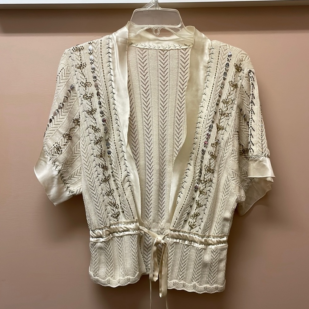 Beaded dress sweater with front drawstring satin tie.